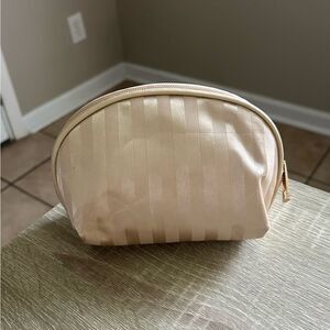 PREOWNED … Gold Striped Cosmetic / Makeup Bag